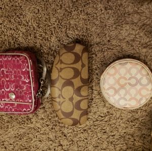 Coach change purse, glasses case. And camera case